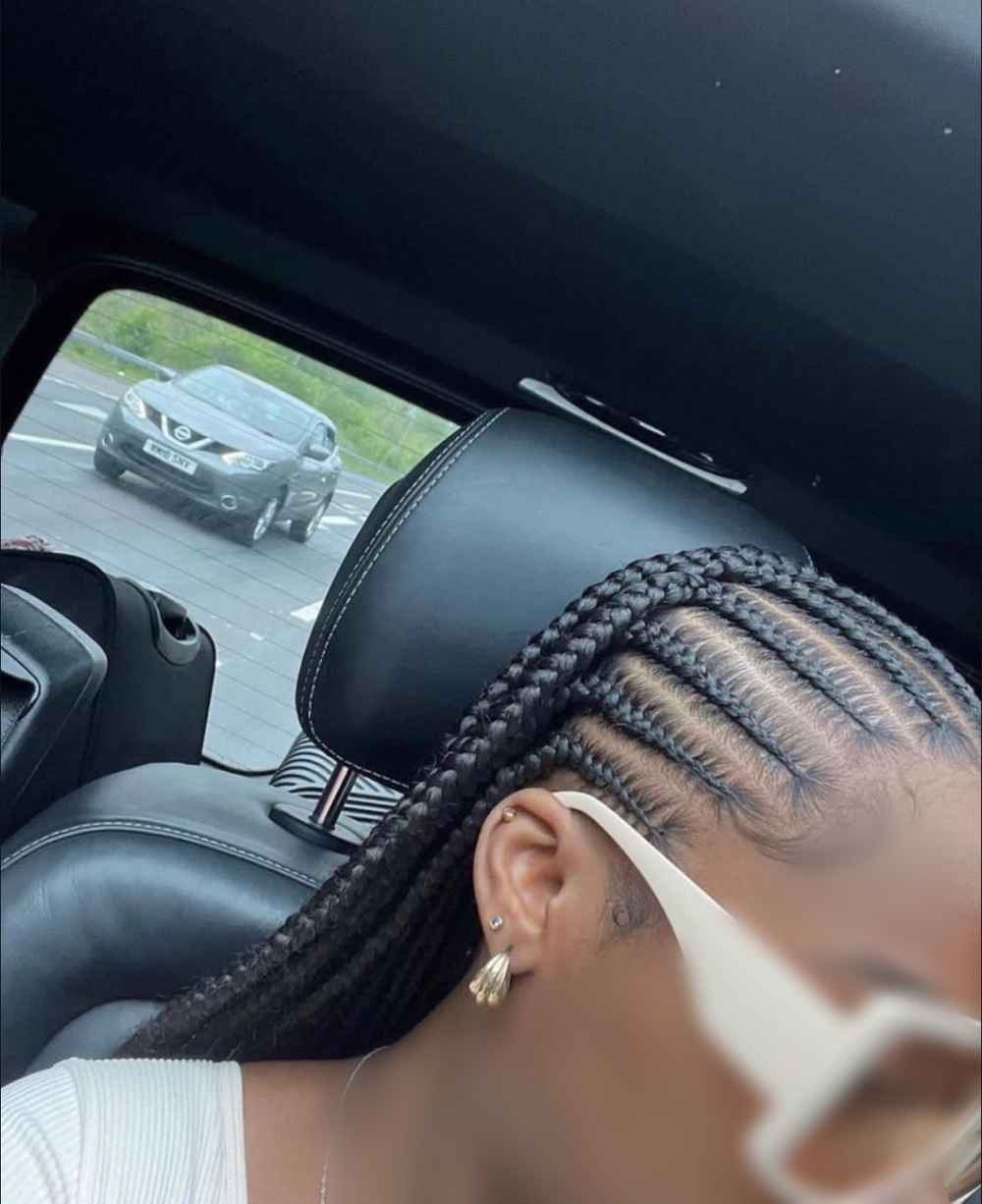 Une image de tresses de type cornrows et braids